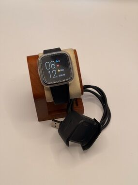 Fitbit Versa 2 (charger included, case protector, tested, very good)